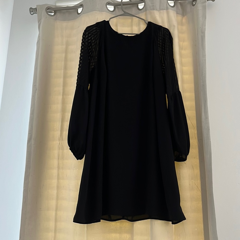 Maurice’s black dress